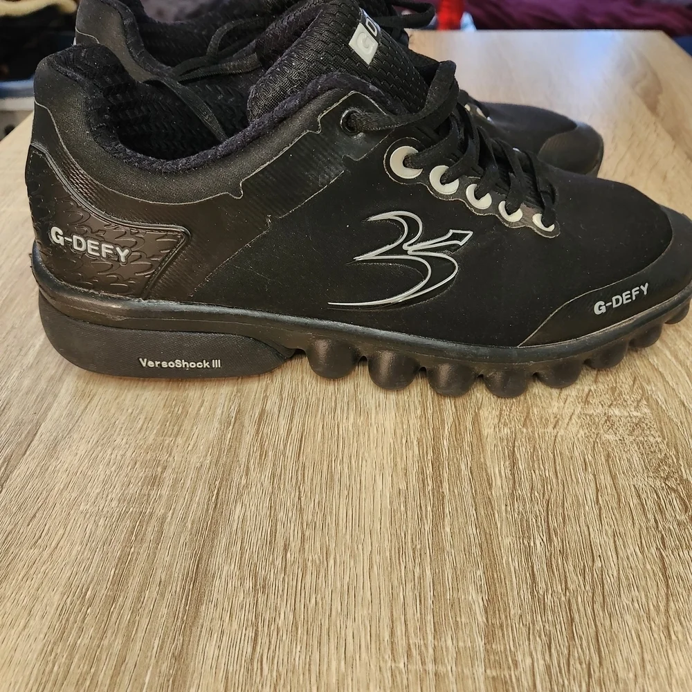 Gravity Defyer G-DEFY athletic shoes featuring VersoShock III technology.